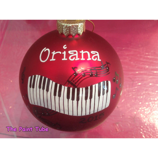 Oriana Piano Keys Theme personalizes Christmas Ball